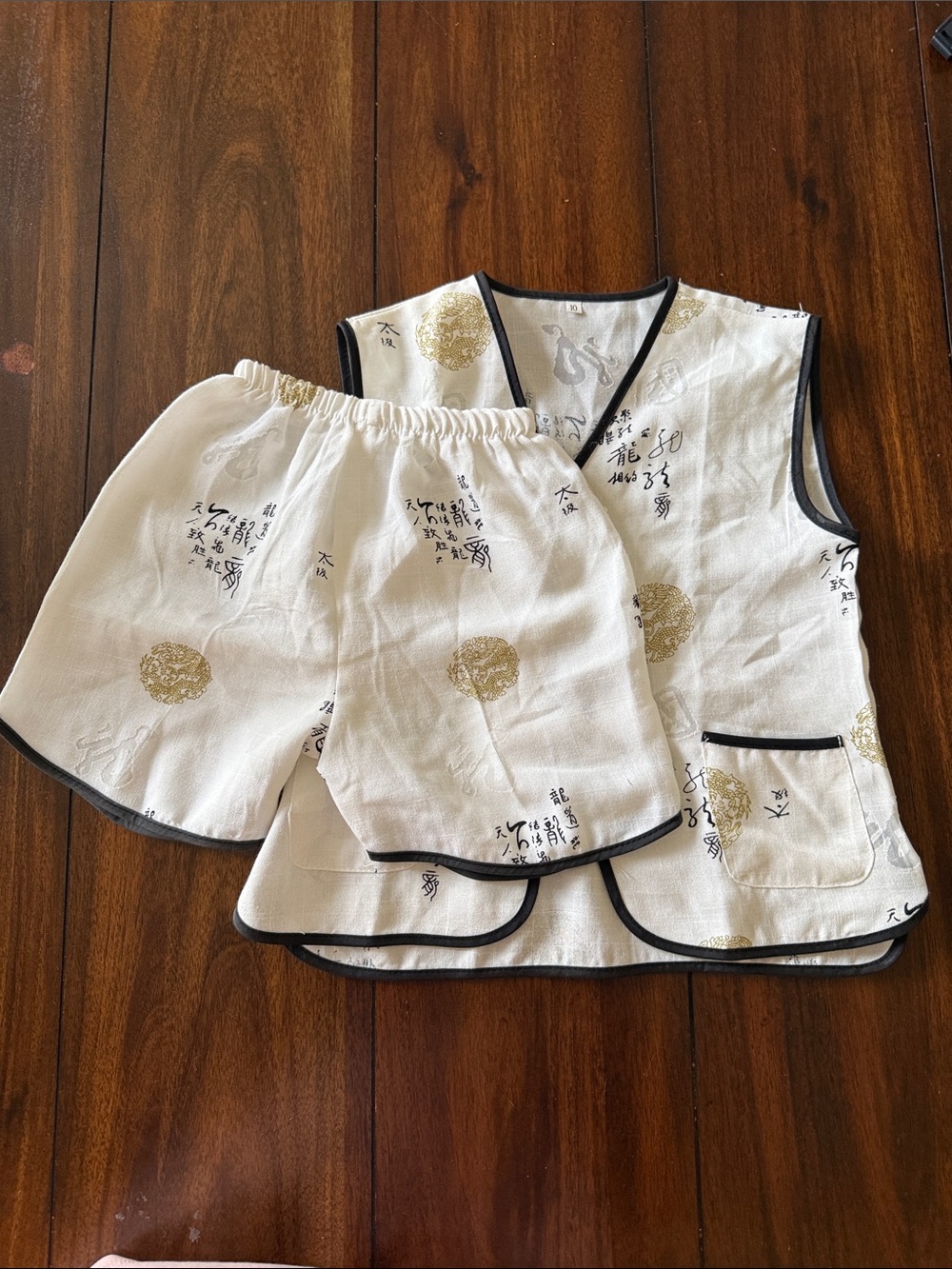 White Asian-Inspired Two-Piece Lounge Set with Black Trim for‎ Children Size 10